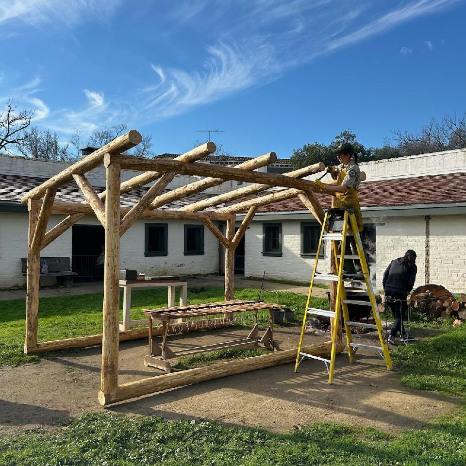 Pictured: California State Parks employees at work constructing the new shade structure